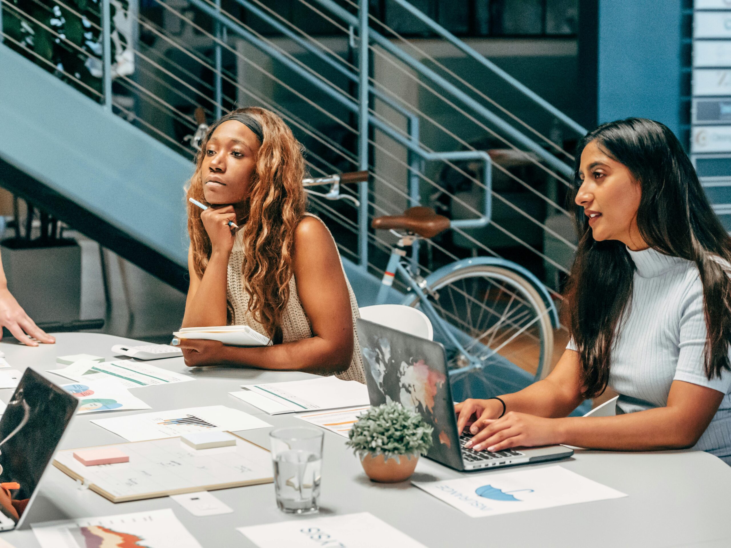 Event Marketing Professionals Discussing in a Table