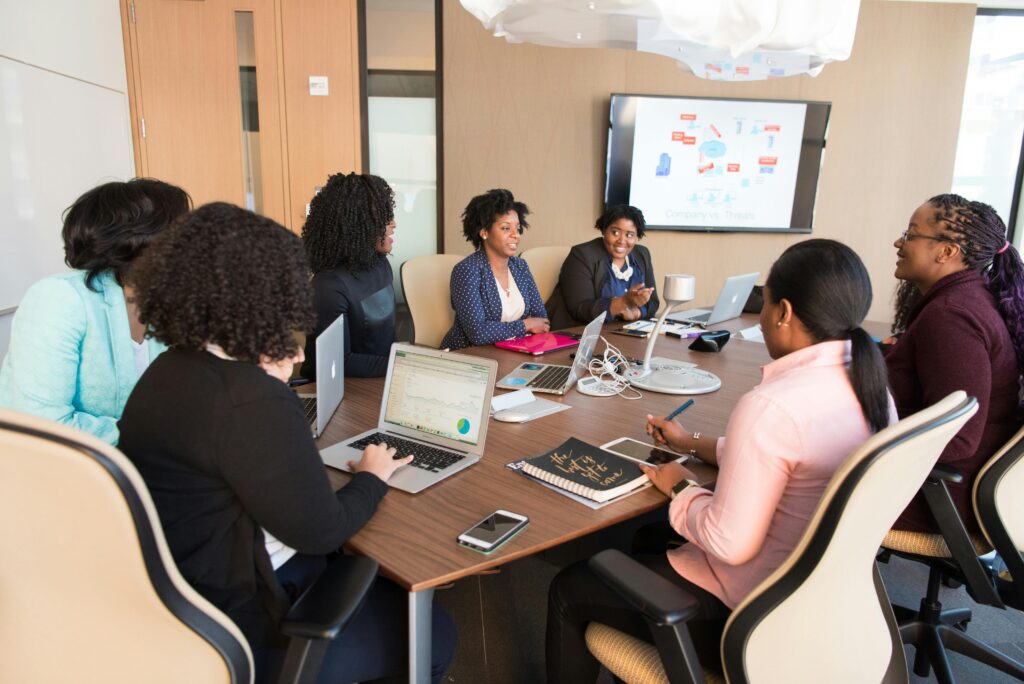 Colleagues gathered in a conference room.